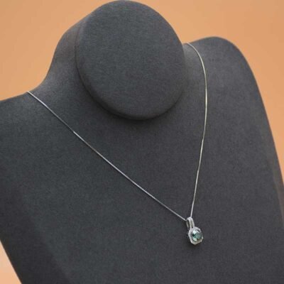 Urisma "Celestial Edge" Green Moissanite Necklace - Side View Showing Detail
